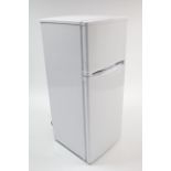 A small upright fridge-freezer in white finish case, w.o. 44½” high.