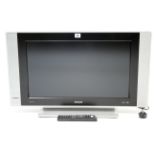 A Philips HD ready 26” flat screen television with remote control, w.o.