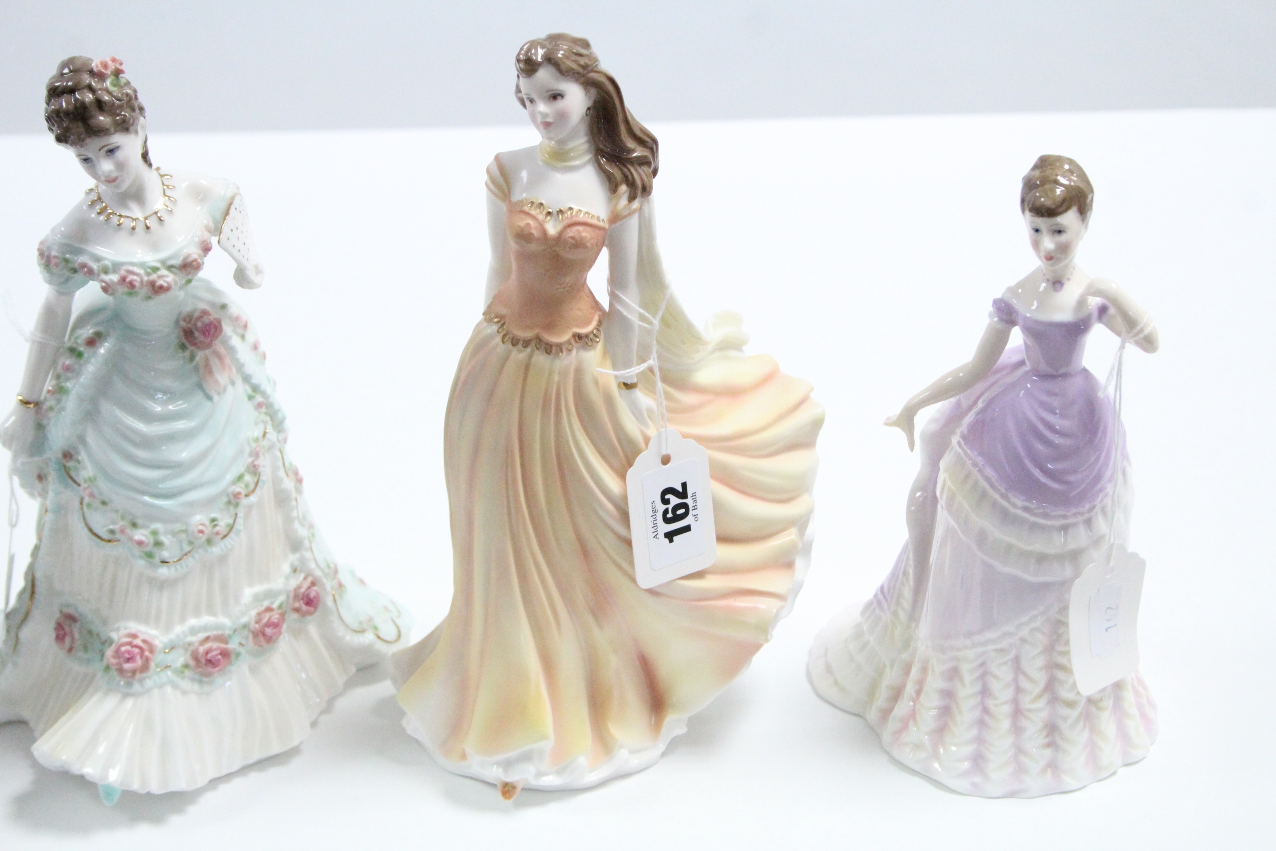 Four Royal Worcester bone china figures “A Royal Anniversary”, “Emily”, “Lullaby”, & “Wistful”. - Image 3 of 4