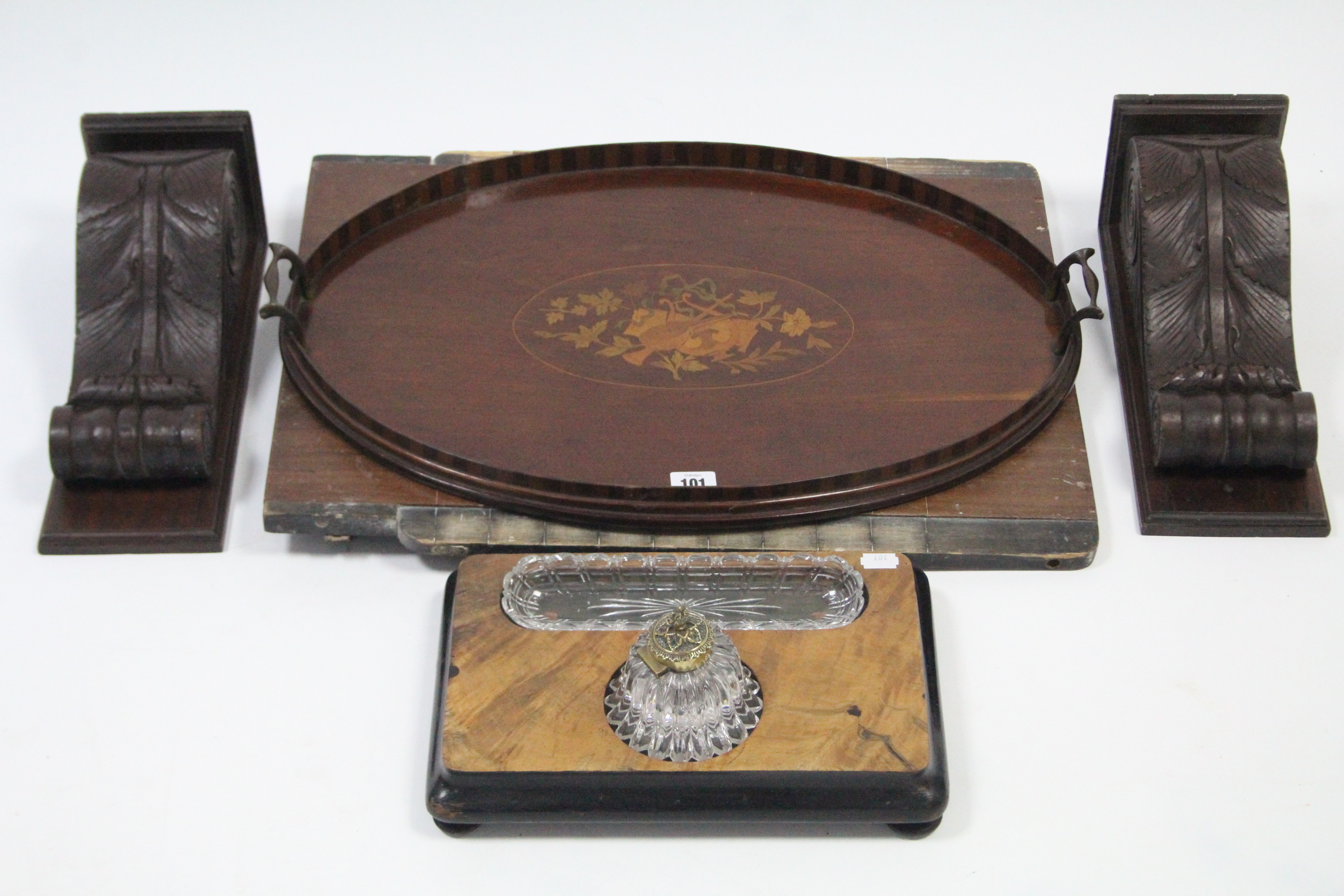 A 19th century marquetry-inlaid mahogany oval two-handled tea tray, 22½” x 15”; a Victorian walnut