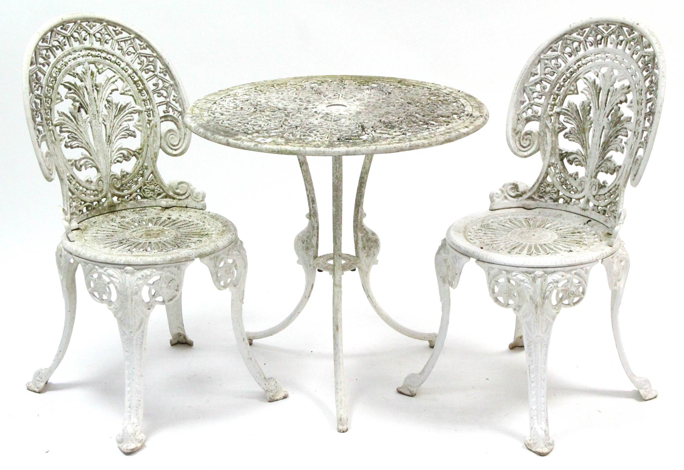 A white painted cast aluminium garden table with pierced circular top & on three shaped legs, 27”