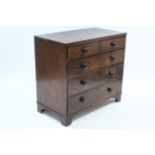 A 19th century mahogany low chest fitted two short & three long graduated drawers with turned knob