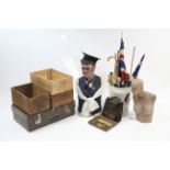 Two mannequins; three wooden crates; various flags & umbrellas; & sundry other items.