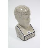 A reproduction ceramic phrenology bust, 11” high.