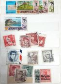 A small collection of mostly foreign stamps in a stock booklet & loose, & various mostly G. B.