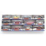 Twelve various Matchbox “Dinky Collection” scale model cars, each with window box.