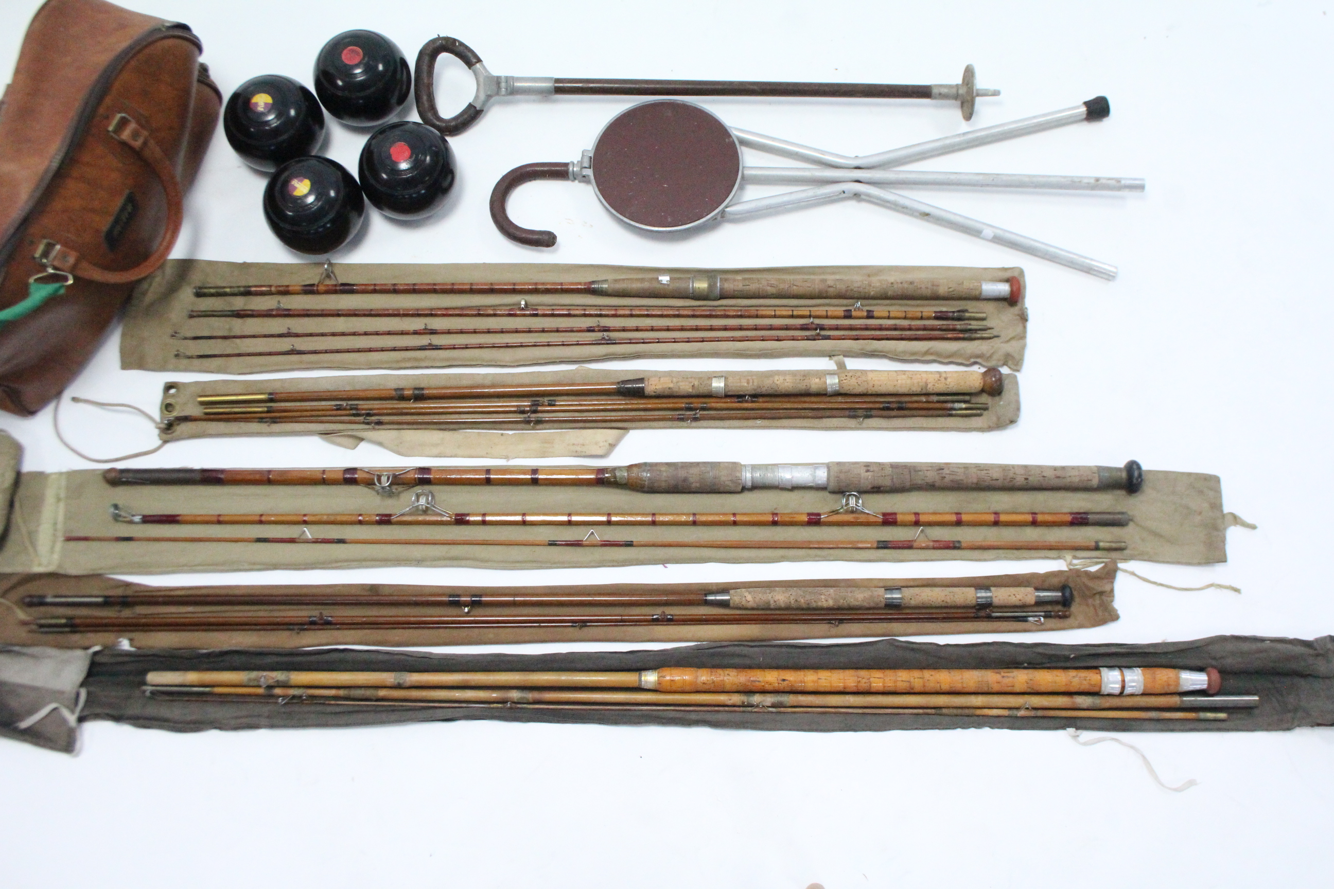 Five cane fishing rods; two shooting sticks; & a set of four lawn bowls. - Image 2 of 4