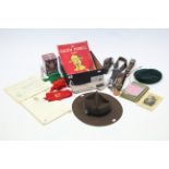 A Boy Scout leader’s wide-brimmed hat; a Boy Scout’s cap; various Boy Scouts belts & neckerchiefs,