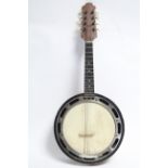 A banjo, 24” long (lacking travelling case).