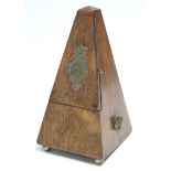 A Maelzel of London metronome in walnut case, 9½” high, w.a.f.