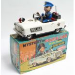 A T. N. (Japanese) battery powered “Mystery Police Car”; a “Jokari” ball game; a Louis Marx Little