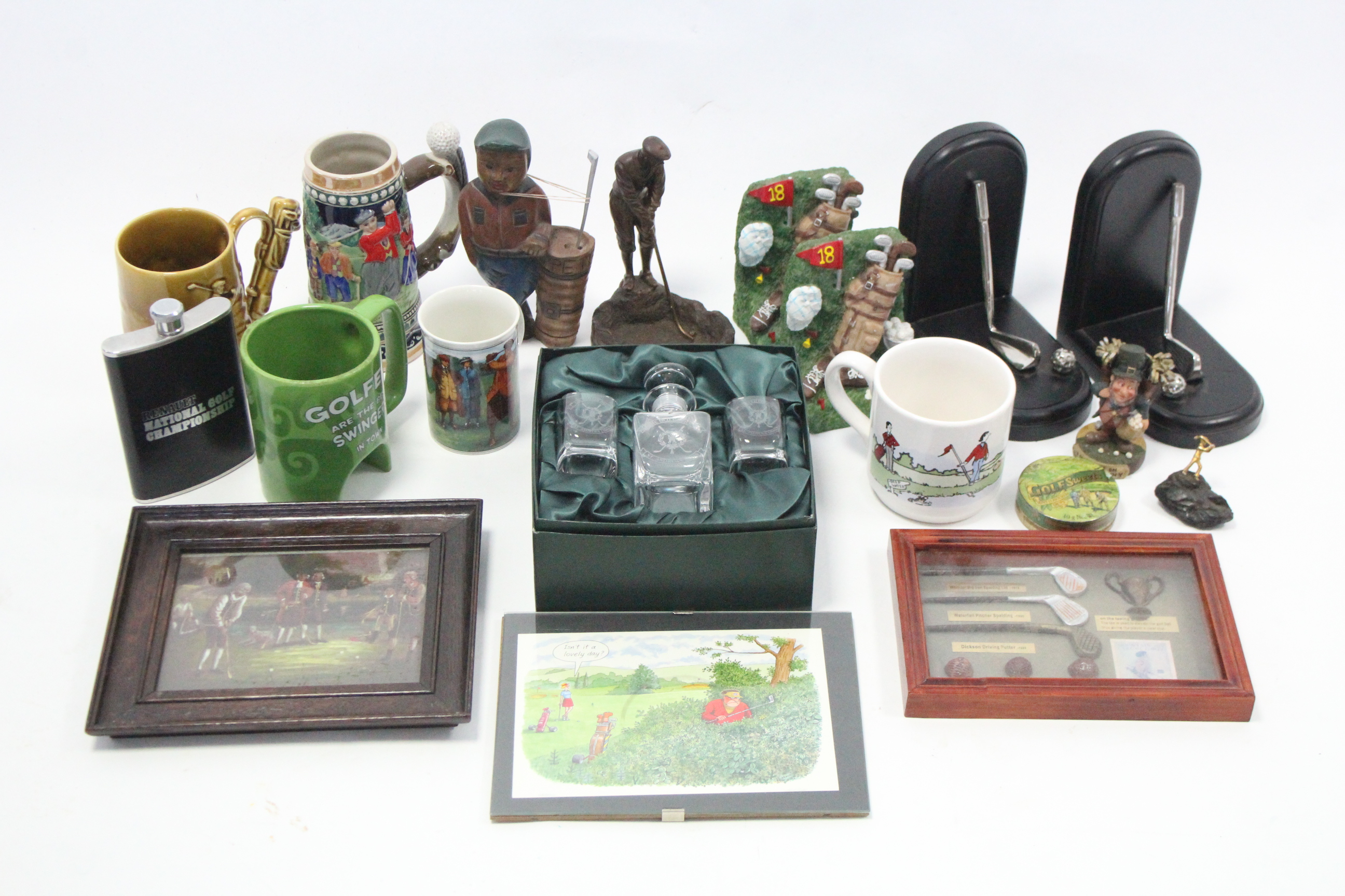 Various golf figures, tankards, etc.