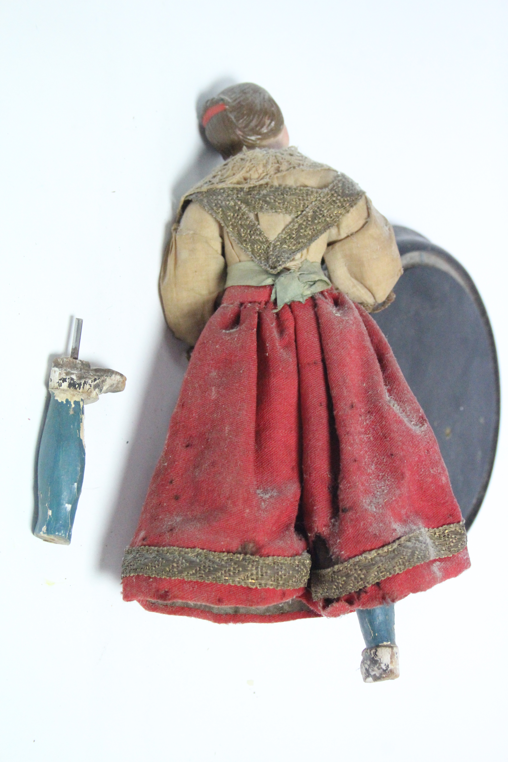 A painted composition peddler doll mounted on ebonised wooden plinth, 11½” high. - Image 2 of 2