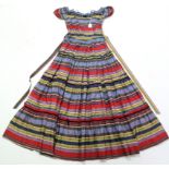 A raw silk ballgown with multi-coloured stripe design, bears label “Sally Slade of Regent Street”,