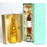 A bottle of Louis Roederer “Crystal Champagne” (750ml); & a bottle of Fortnum & Mason “Sauternes”, &