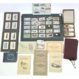 A collection of assorted cigarette cards contained in nine albums & loose.