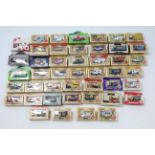 Approximately forty various Lledo scale model vehicles, all boxed.