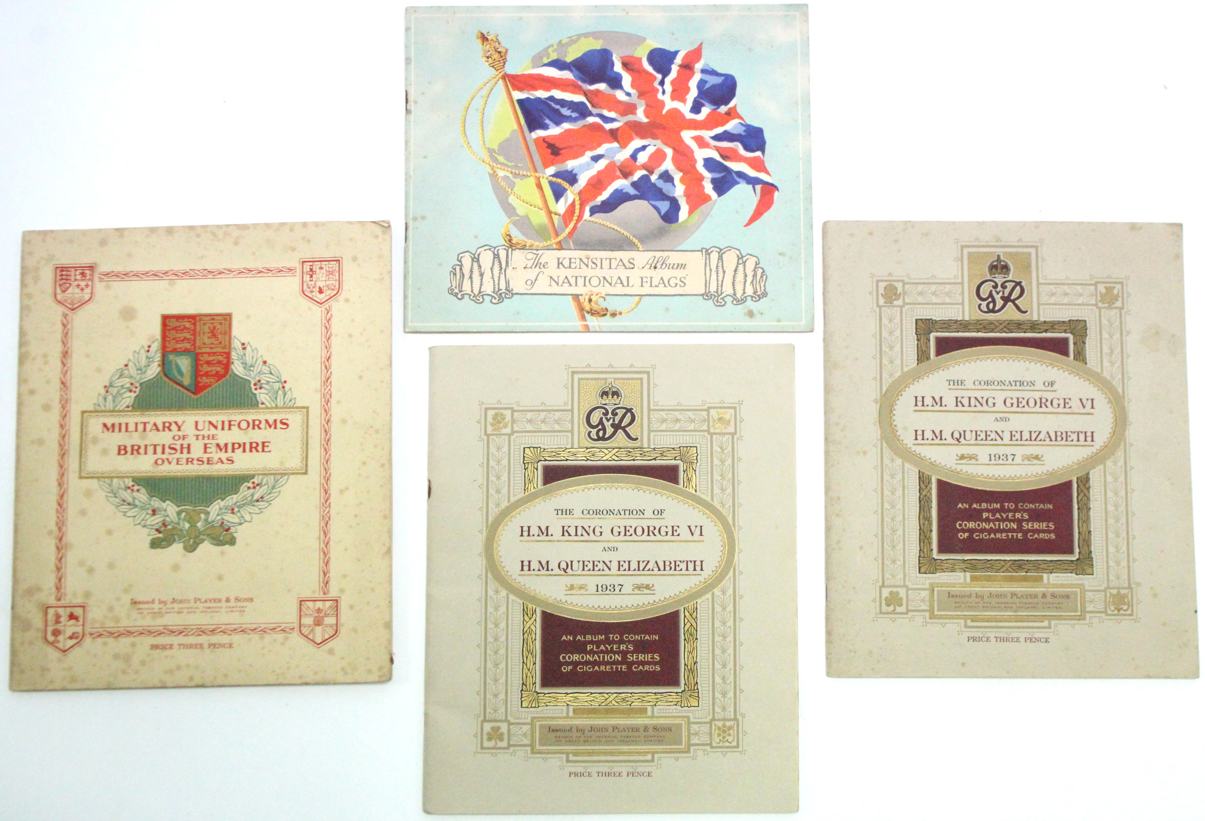 A Kensitas picture card album of “National Flags” (silk) cards; together with three John Player