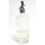 A “J. KERSWELL of EXETER” glass soda siphon bottle, 12” high.