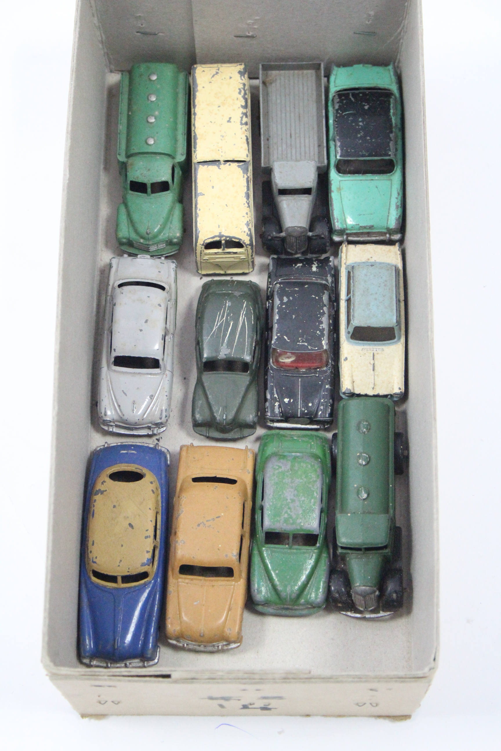 Twelve various Dinky scale models including an “Observation Coach”, a “Hudson Sedan”, a “Vauxhall