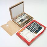 A Winsor & Newton artist’s paint box with contents; & a Hornby Railways part electric train set,