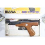 A Diana “G4” .177 calibre air pistol, boxed; & five various fishing reels.