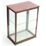 A late 19th/early 20th century mahogany shop’s counter-top display cabinet, fitted two plate-glass