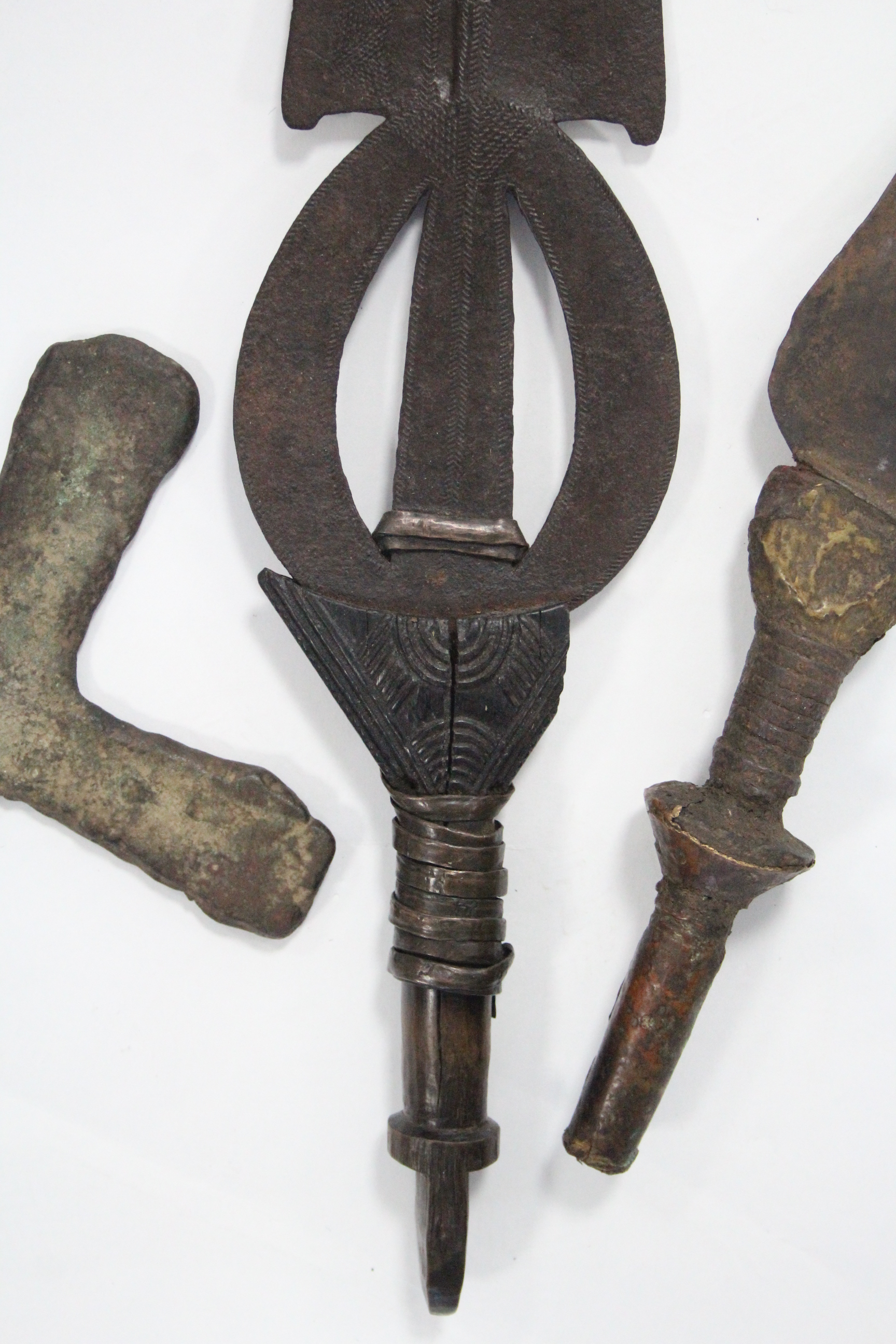 A Congolese ceremonial dagger, the pierced blade with tooled “herringbone” decoration, & with carved - Image 4 of 7