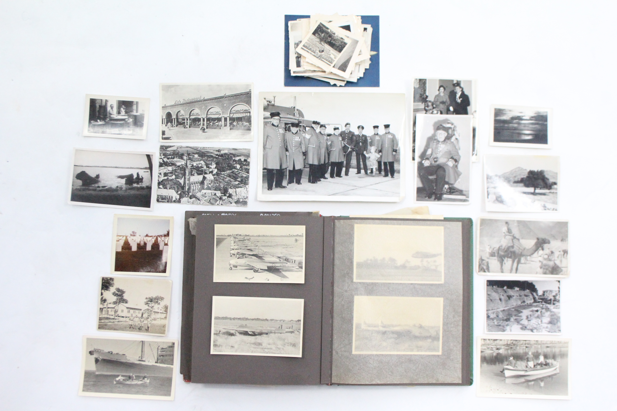 A mid-20th century photograph album containing numerous photographs of aircraft, foreign views,