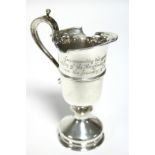 A silver helmet-shaped jug with engraved inscription commemorating the 350th anniversary of the