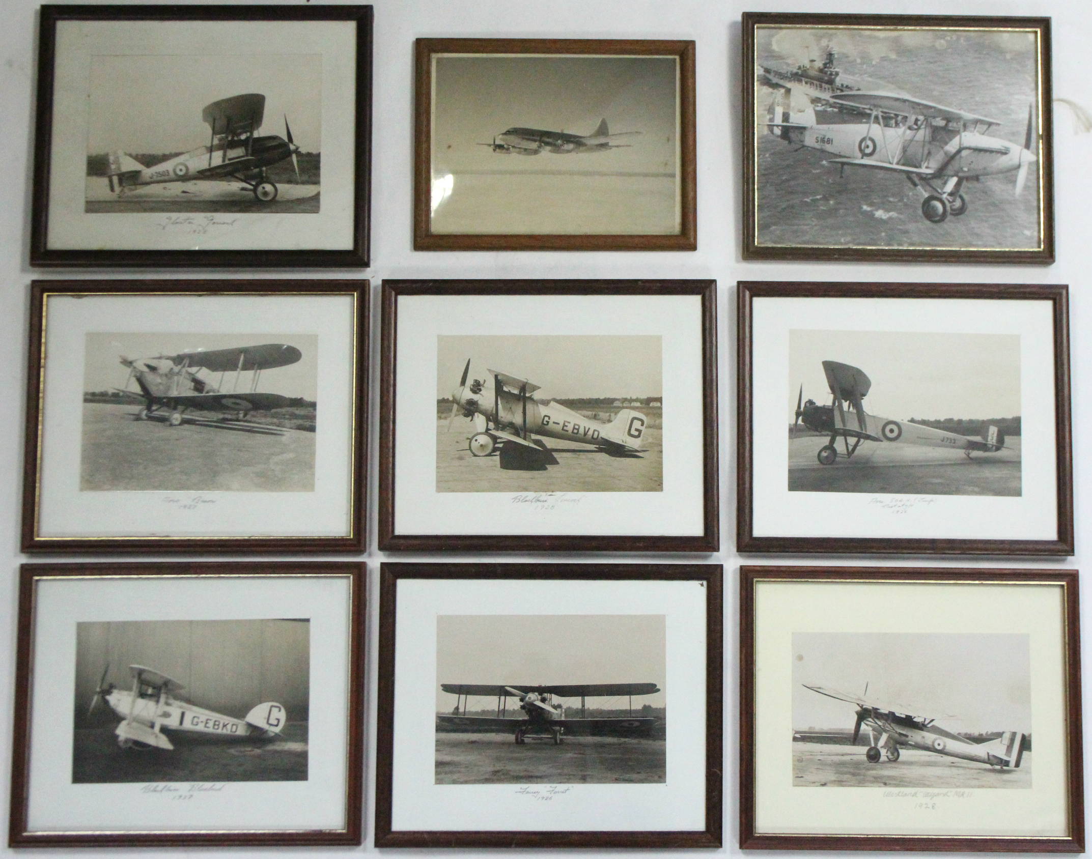 Eight sepia photographs of aeroplanes, circa 1920’s onwards, each in glazed frame.