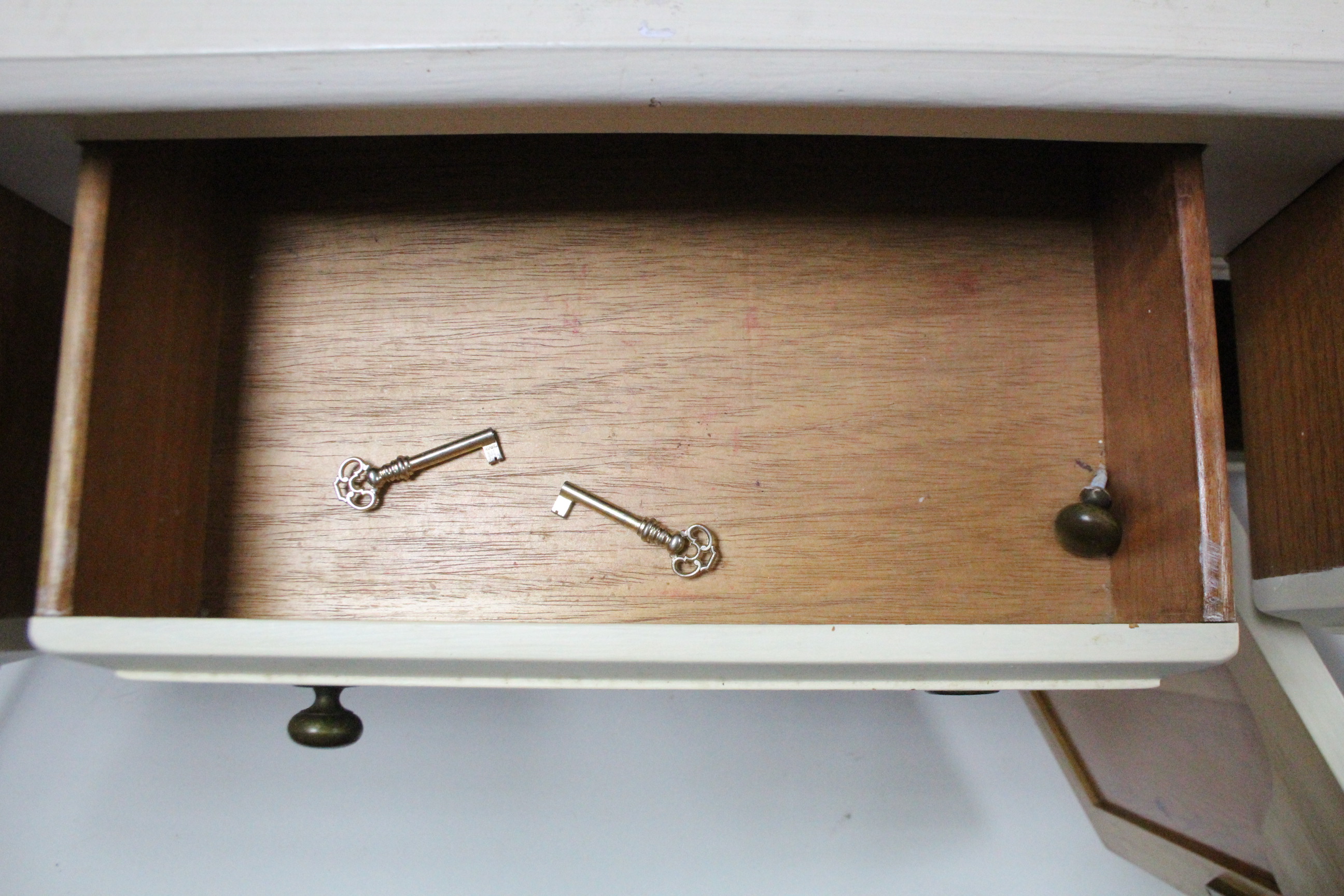 A cream painted pine dresser, the upper part fitted two open shelves & with panelled back, the - Image 4 of 4