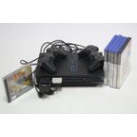 A Sony Playstation 2 games console with various accessories; a Sky+ HD box, etc., all w.o.