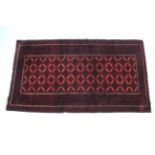 A Persian pattern rug of crimson ground, & with all-over repeating geometric design, 42” x 76”; &