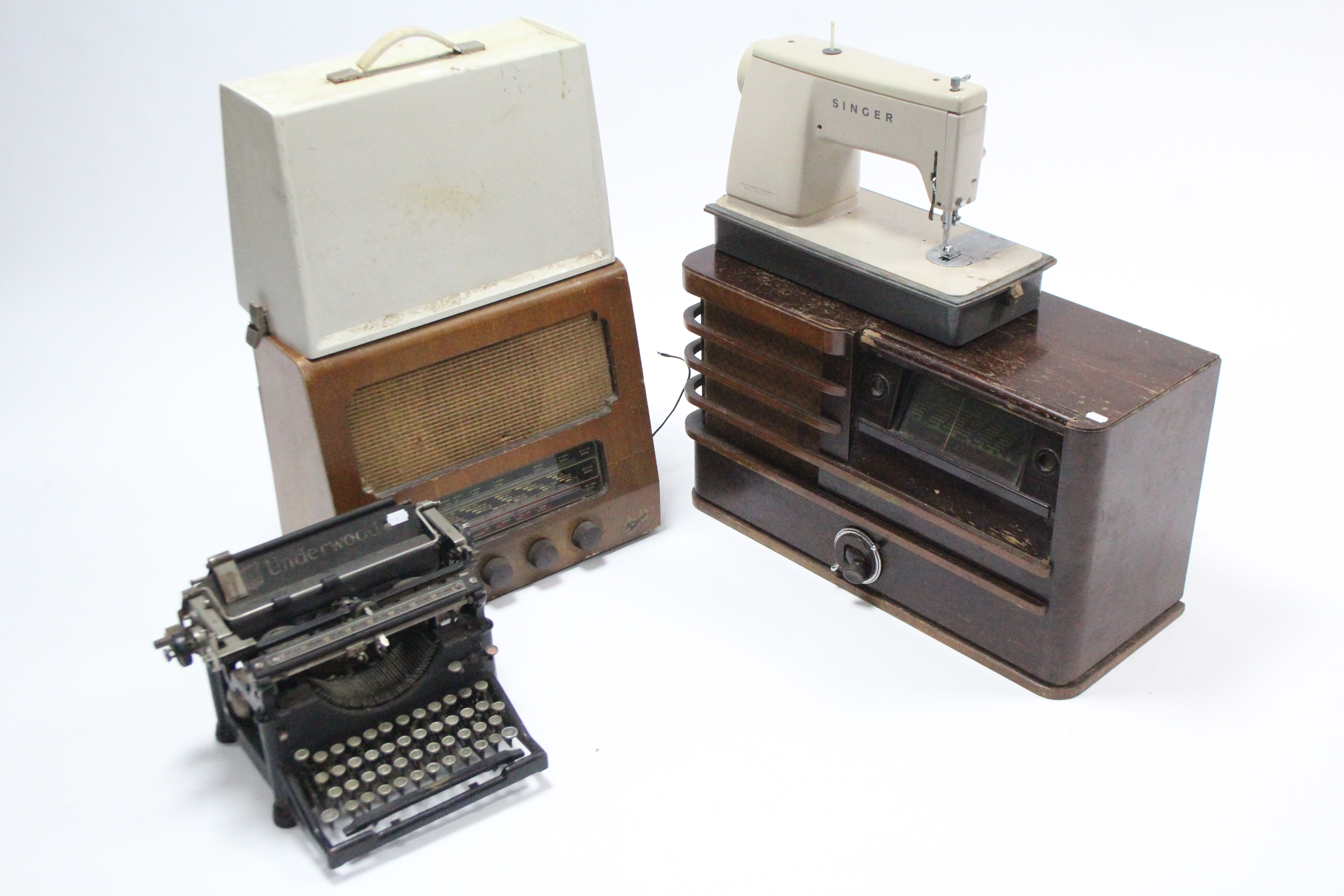 A Marconi valve radio in walnut-finish case; together with another valve radio; an Underwood