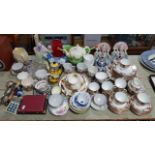 A Clifton china “Devon” pattern thirty six piece tea service; a Royal Worcester floral decorated tea