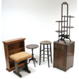 A mahogany folding cake stand, (w.a.f.); a wine table; an oak bedside cabinet; a pine standing