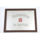 A frameless oval wall mirror; a painted oak oval occasional table; a “Worthington’s” advertising