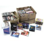 Approximately two hundred various CDs, DVDs, & Playstation 3 console games.