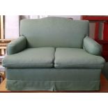 A Wesley Barrel three-piece lounge suite upholstered pale green fabric, comprising a two-seater