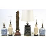 Six table lamps; three large pottery vases; & various other decorative ornaments.