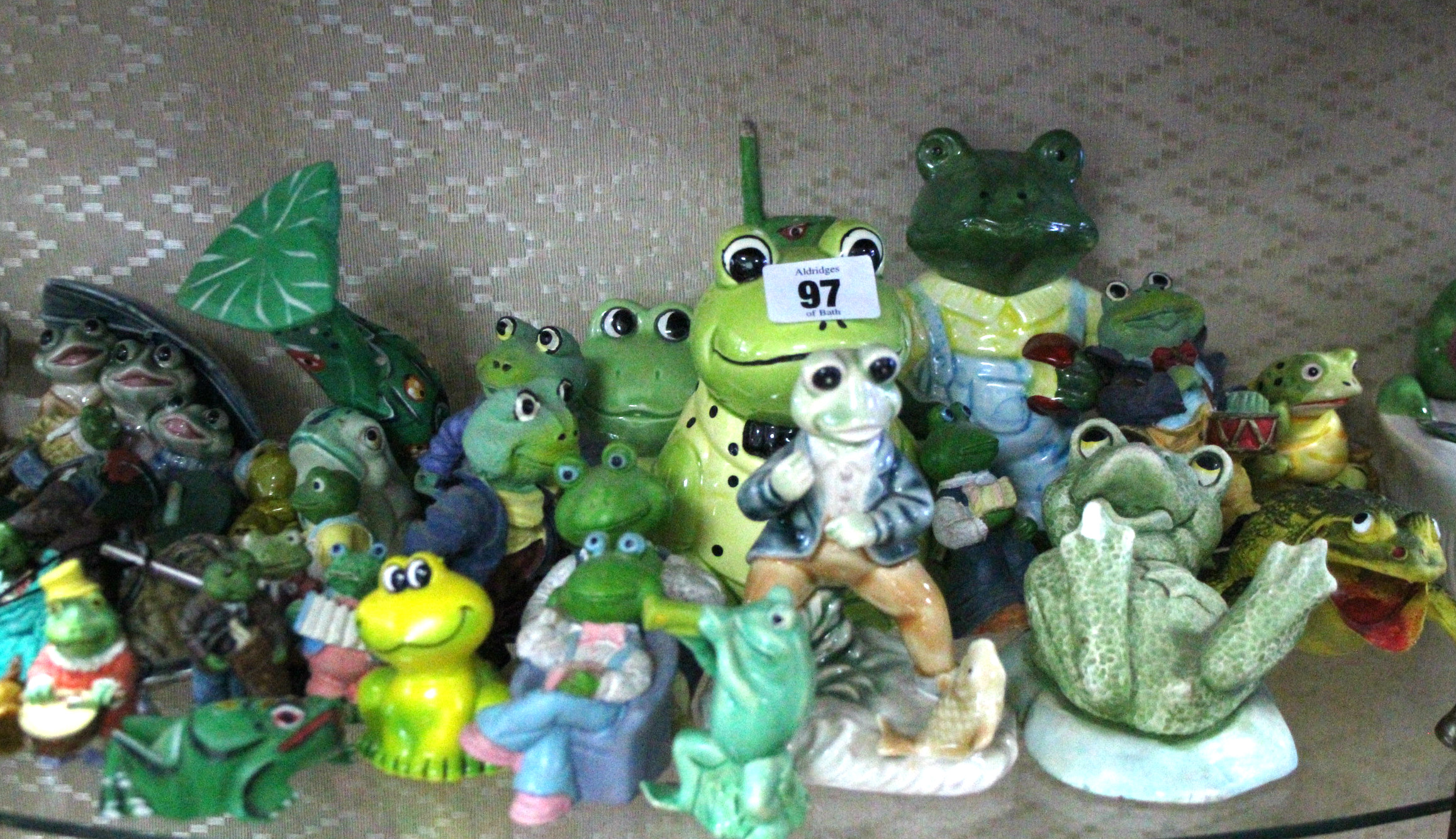 A collection of assorted bear & frog ornaments.