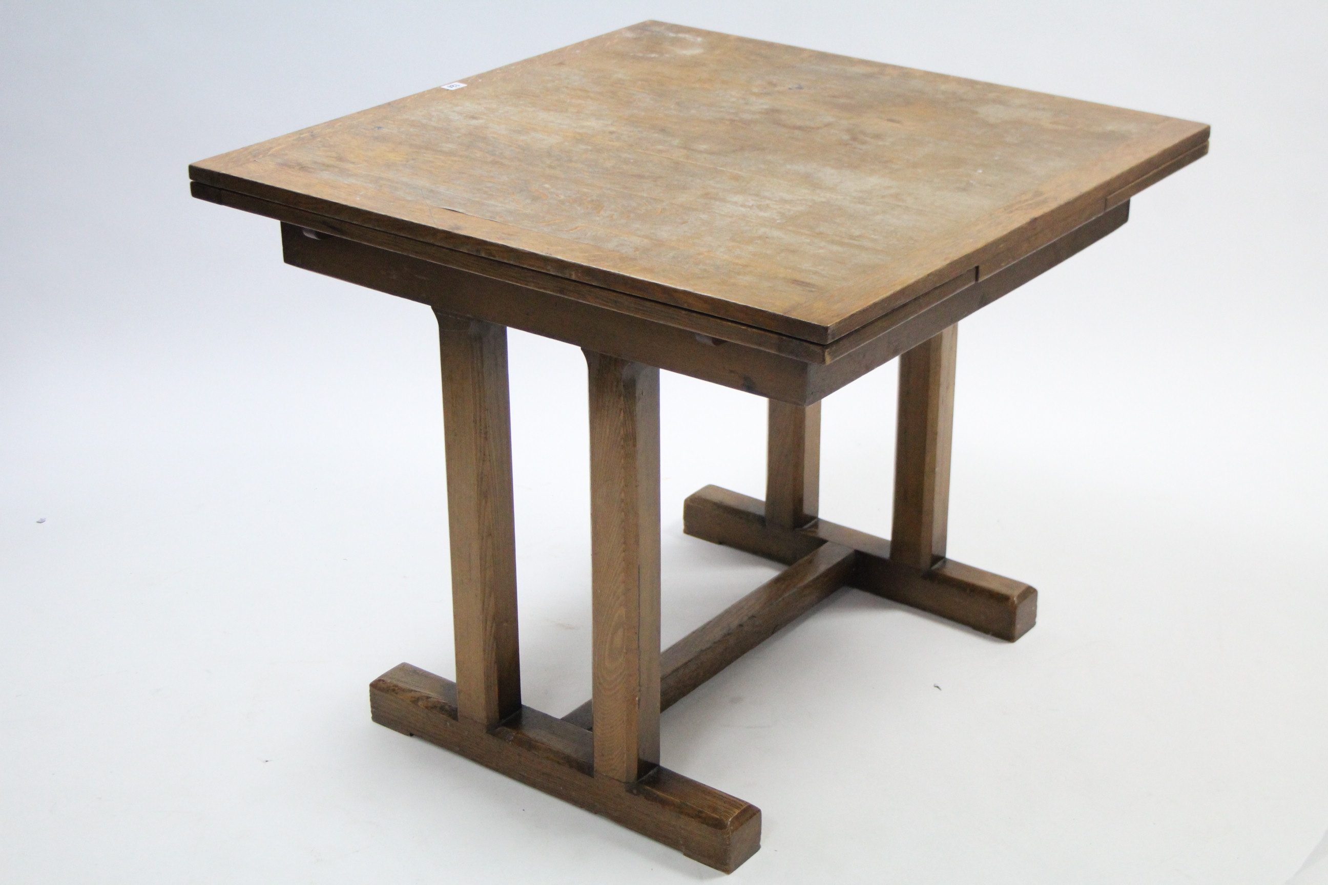 A mid-20th century oak draw-leaf dining table on pair of square tapered end supports to either end - Image 2 of 3