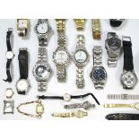 Thirty-two various ladies & gents wristwatches.