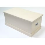 A Victorian white painted pine blanket box with hinged lift-lid & wrought iron side handles, 37¼"