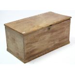 A pine blanket box with hinged lift-lid & on plinth base, 36” wide.