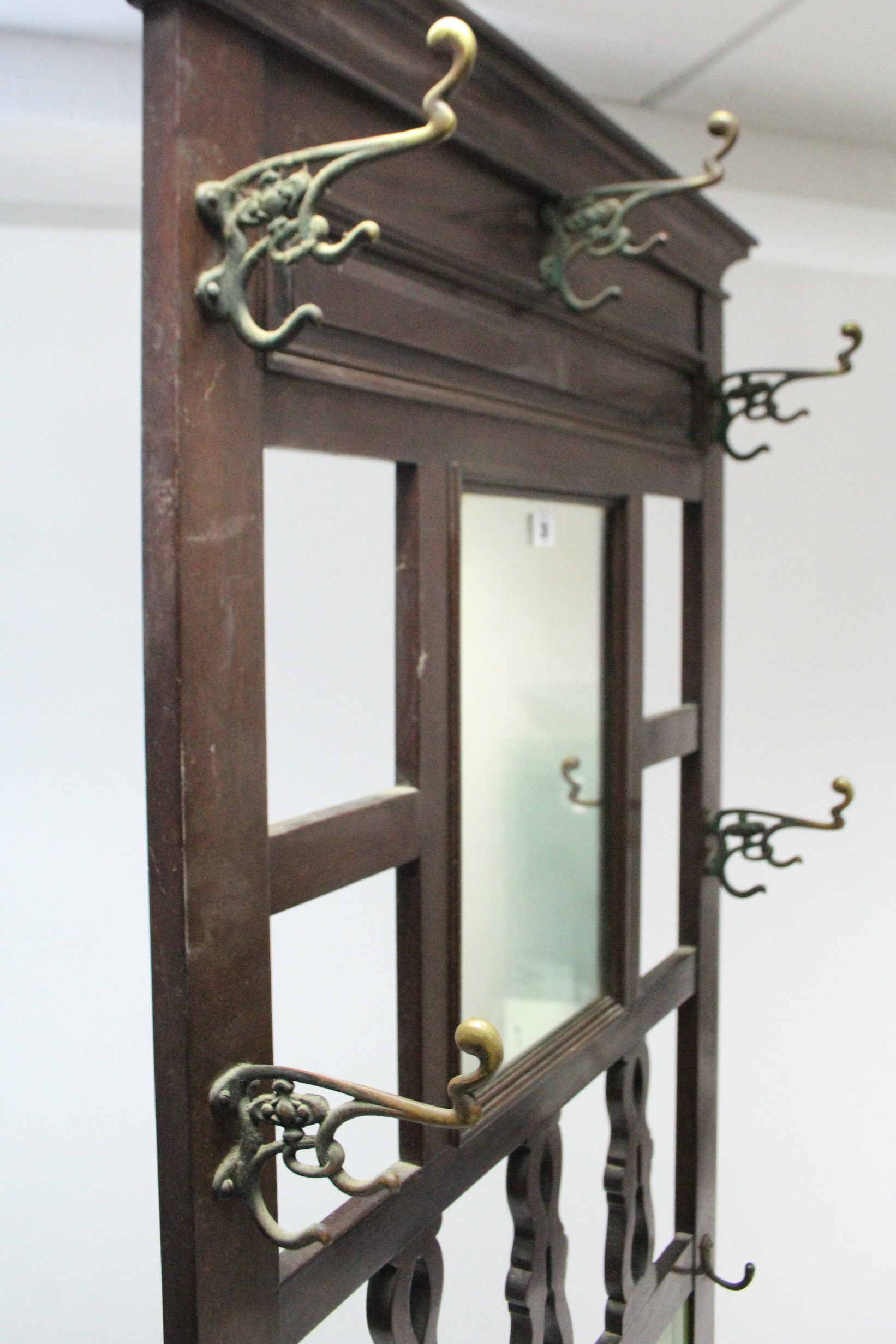 A Victorian walnut hallstand, inset rectangular mirror above a glove compartment, & on baluster- - Image 2 of 5