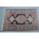 Two Persian pattern rugs, 7’ x 5’8”; & 6’8” x 4’6” (one worn).