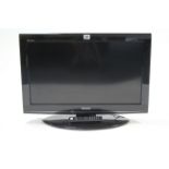 A Toshiba ‘Regza’ 25” LCD colour television, with remote control, w.o.