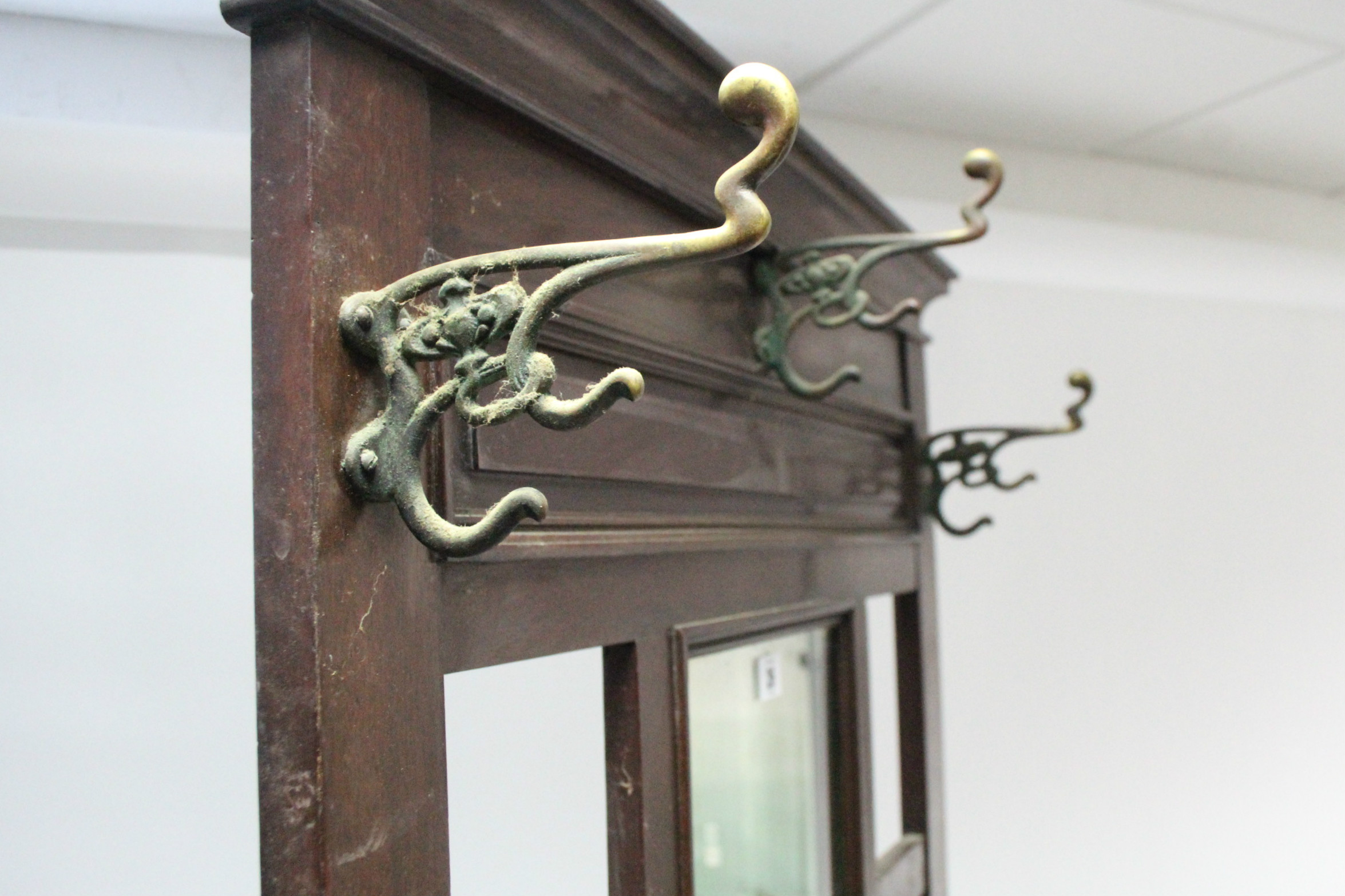 A Victorian walnut hallstand, inset rectangular mirror above a glove compartment, & on baluster- - Image 3 of 5